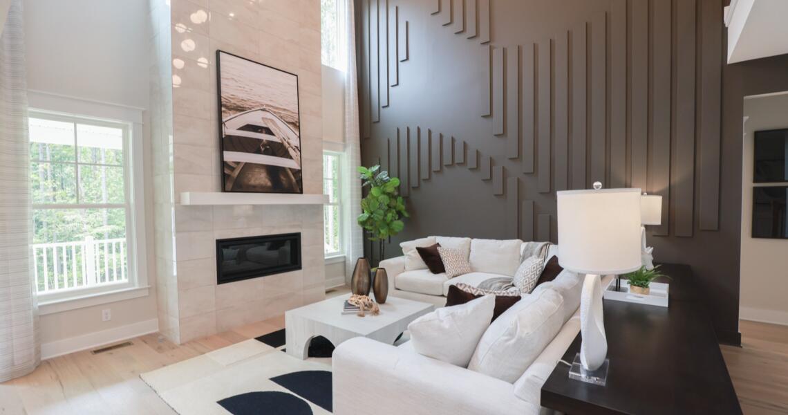Two-story living room wood slat accent wall