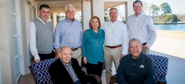 The Napolitano Homes family with the Eastwood Homes family
